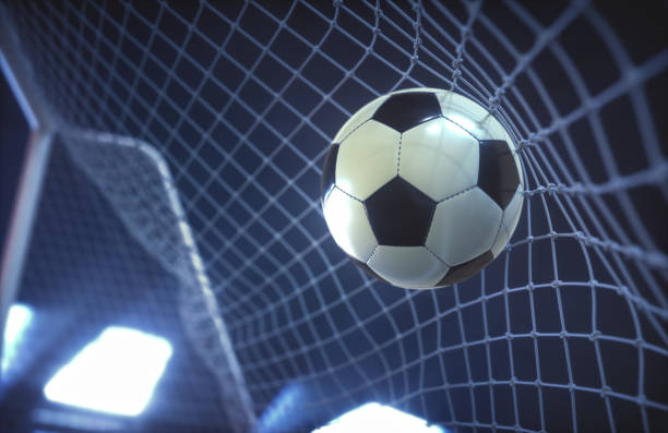istock Soccer Ball Scoring Goal 1303743344