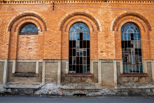 istock Ancient and abandoned industrial building 1303743396