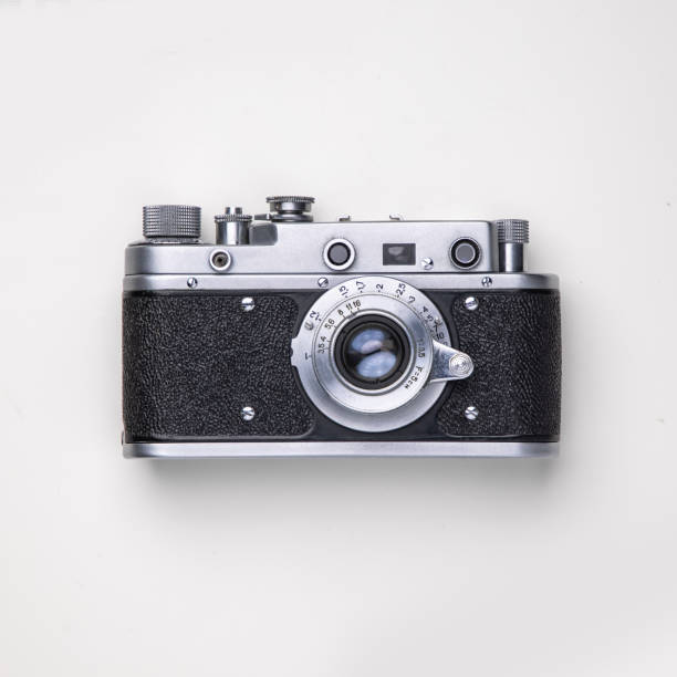 istock Old, retro, vintage  camera over white with clipping path 1303743635
