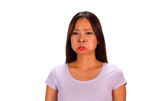 istock Sad asian woman 1303744284