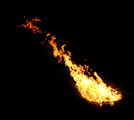 Hot fire flames on black background.