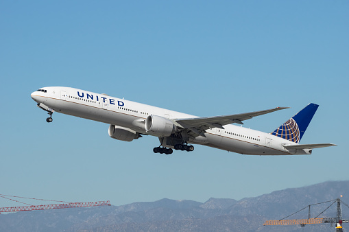Los Angeles International Airport, California, USA - February 22, 2021: this image shows United Airlines Boeing 777 with registration N2138U departing.\