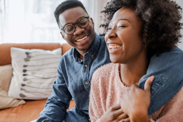 istock Cute African American couple at home 1303749103