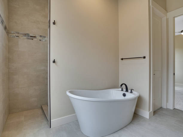 Modern Master Bathroom Freestanding Bathtub and Shower stock photo