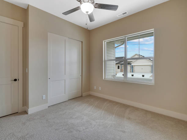 istock Empty Modern New Guest Bedroom New Construction 1303750092