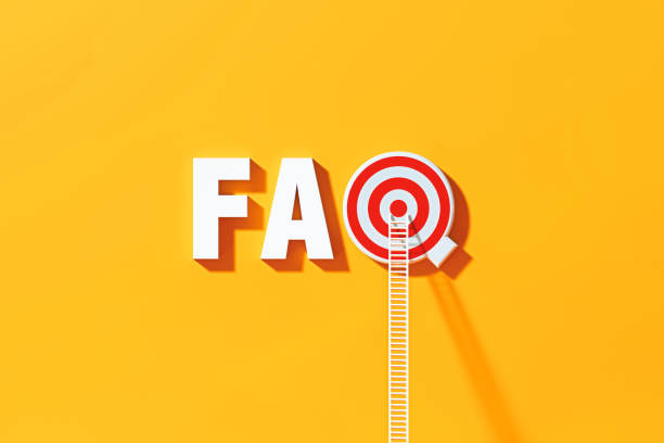 istock FAQ Concept - White Ladders Leaning On To FAQ Written Bull's Eye Target on Blue Wall 1303751199