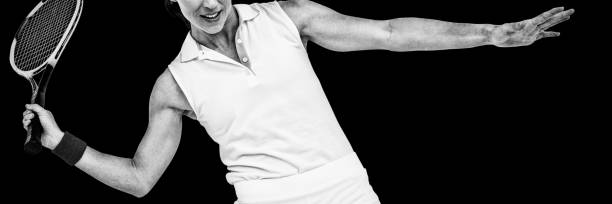 istock Athlete playing tennis with a racket 1303751947