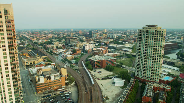 istock Train Leaving Chicago Loop at Dawn - Aerial View 1303756802