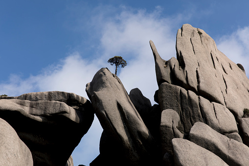 View of mountainous rock formations at Huangshan Mountain in China.