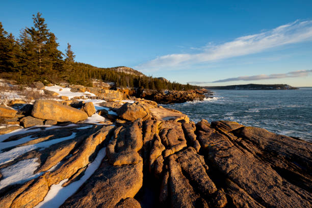 istock Snow Covered Rocky Coastline 1303763744