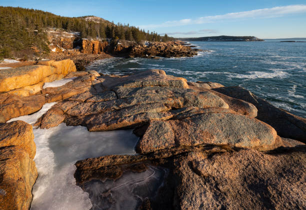 istock Surf and Rocky Coastline 1303763775