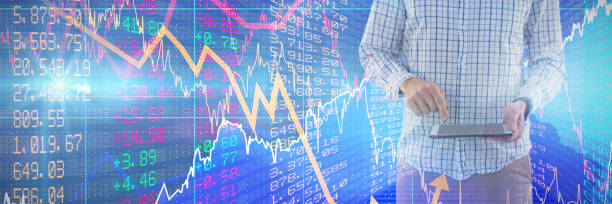istock Composite image of mid-section of man using a tablet 1303766178