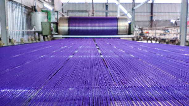 istock Process of starch yarn in textile factories 1303774226