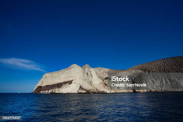 Socorro San Benedicto Island And Volcano In Ocean Stock Photo - Download Image Now - Absence, Archipelago, Beauty