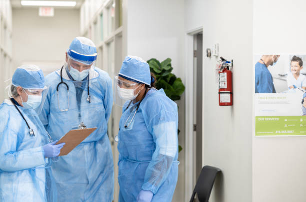 istock Checking Our Patients List Stock Photo 1303776772