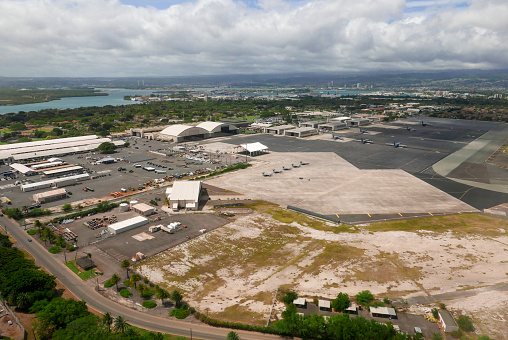 Aerial view of Hickam Air Field with military aircrafts on the ground at Joint Base Pearl Harbor-Hickam, Honolulu, Hawaii in May 2018