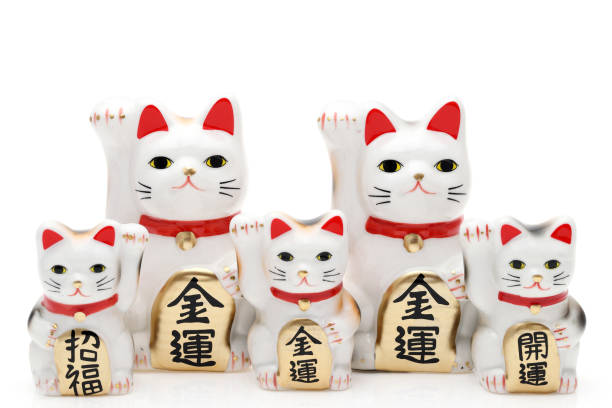 istock Japanese lucky cat on white background 1303777876
