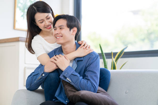 istock Young couple at home 1303780738