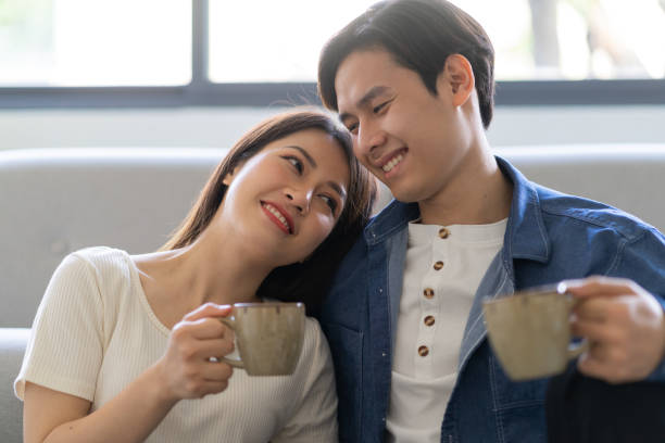 istock Young couple at home 1303780758