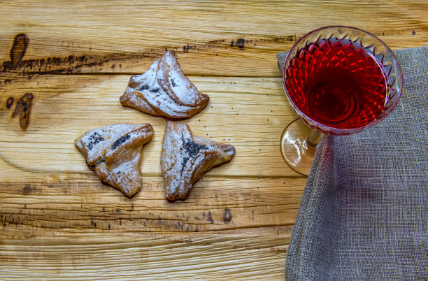 istock Hamentaschen cookies with fruit jam filling 1303782529