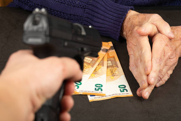 betteln ums leben - currency crime gun conflict stock-fotos und bilder