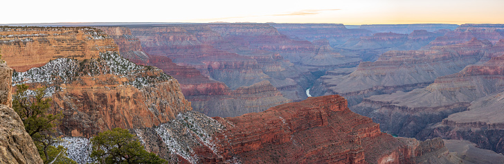 A woman standing on the Grand Canyon National Park in the USA