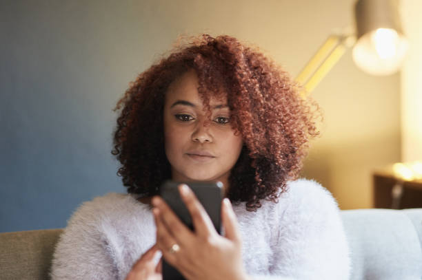 istock Keeping in touch with her friendship circle 1303789674