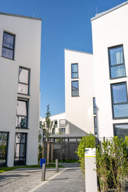 istock Modern white townhouses 1303790891