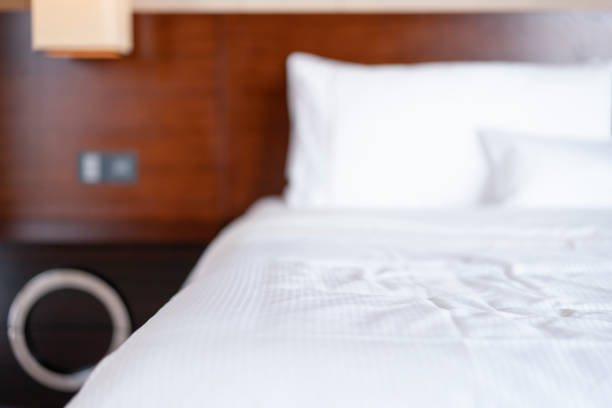 istock Comfortable bed in the bedroom 1303792938