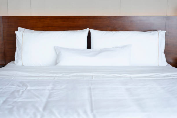 istock Comfortable bed in the bedroom 1303793623
