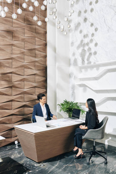 istock Discussing investment strategy 1303794975