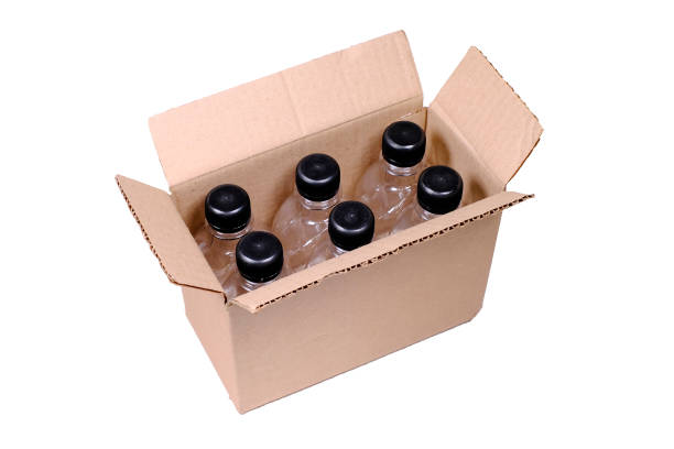 istock paper box with plastic bottles. isolated on a white background 1303795094
