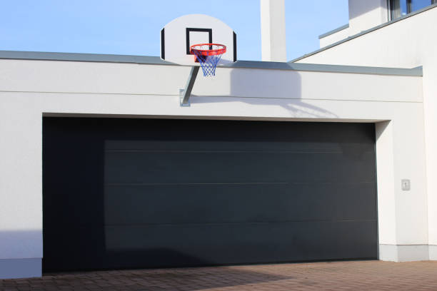 istock Modern new garage door (sectional door) 1303799204
