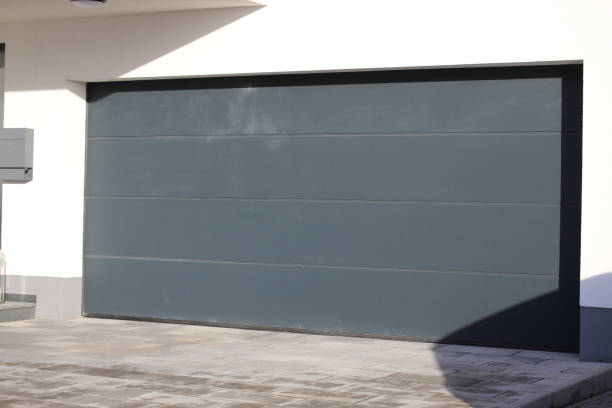 istock Modern new garage door (sectional door) 1303799213