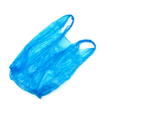 istock Used plastic blue bag isolated on white. Crumpled recycle bag. 1303804391