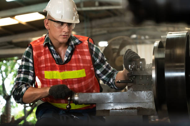 istock Smart factory worker or engineer do machine job in a manufacturing workshop 1303804985