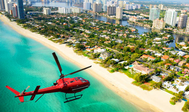 istock Helicopter flying to Miami. Aerial View. 1303805992
