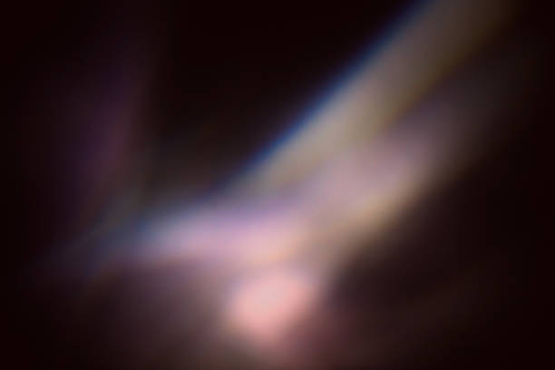 istock colorful warm rainbow light leaks on black background with dust texture 1303806301