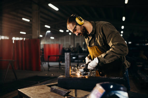 Welder working in a factory