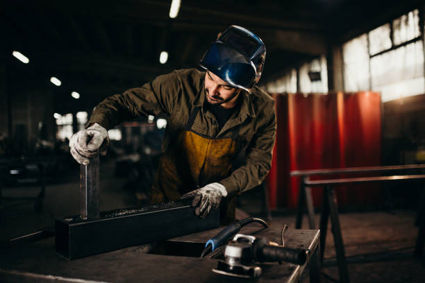 istock Welder working in a factory 1303810518