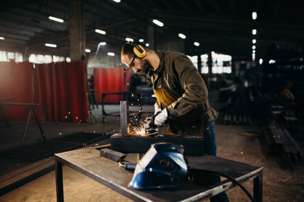 istock Welder working in a factory 1303810553