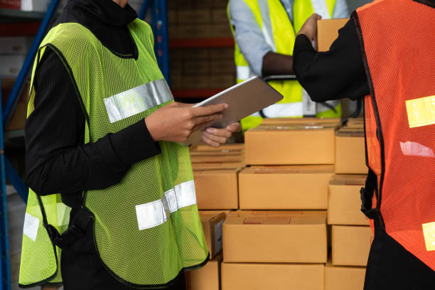 istock Warehouse worker working together in the storehouse 1303811210