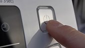 Pressing Stand By Power Button To Turn On and Off the Device Close-Up