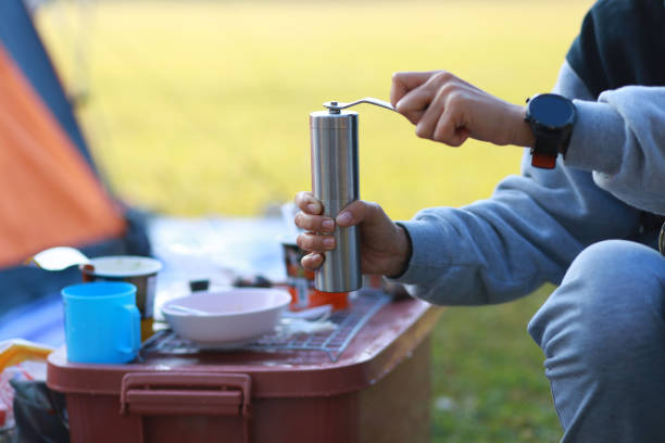 istock Coffee on morning time in camping. 1303814361