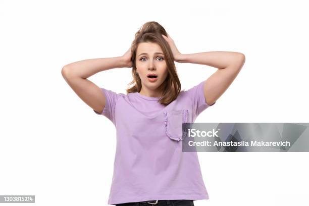 Portrait Of Worried And Anxious Girl Grab Head And Panicking Staring Alarmed Dont Know What Do Stock Photo - Download Image Now