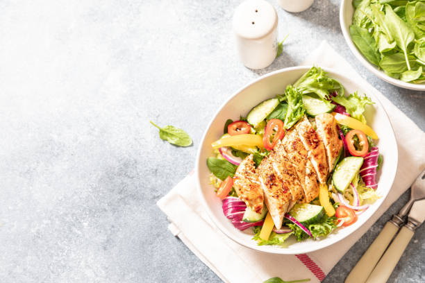 grilled chicken fillet with salad. healthy food, keto diet, diet lunch concept. - chicken salad grilled chicken grilled imagens e fotografias de stock