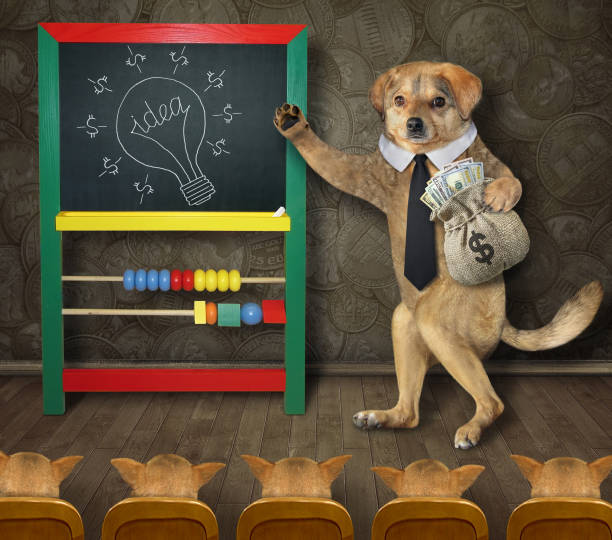 istock Dog coach teaches to make money 1303821912