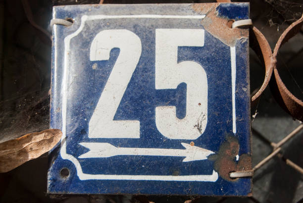 istock Weathered enamelled plate number 25 1303822149
