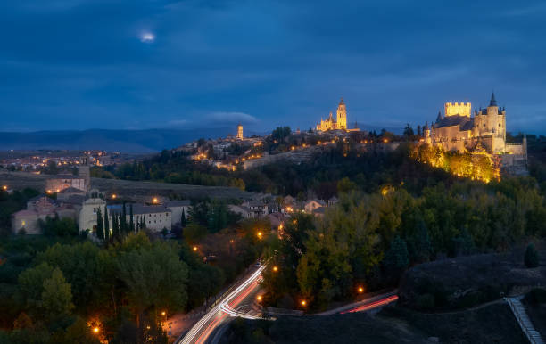 Beautiful aerial view during the blue hour, of the city of Segovía, its alcazar, cathedral and historic architecture, a UNESCO World Heritage Site