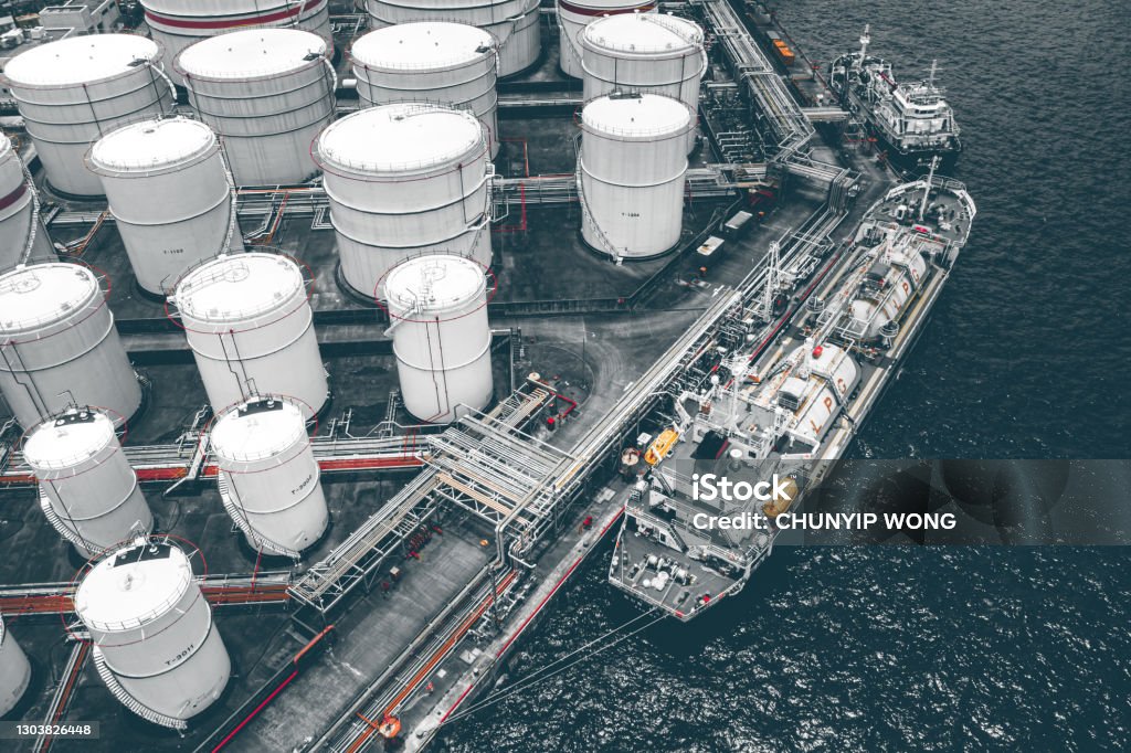 Several huge tanks for storing fuel. Liquefied Natural Gas Stock Photo
